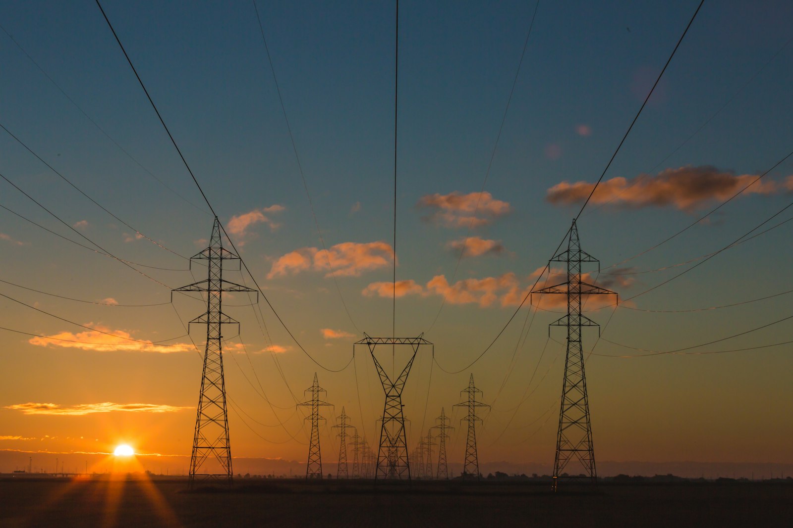 Electricity transmission lines at sunset
